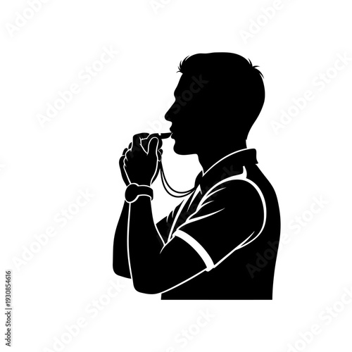 Silhouette of a man in prayer with headphones listening in quiet contemplation.