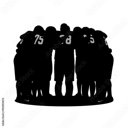 Silhouetted sports team huddle forming unity before game.