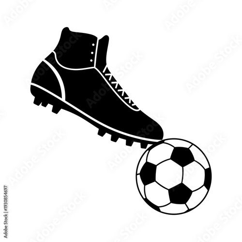 Black soccer boot striking a ball in action, close up of athletic footwear and sport scene.