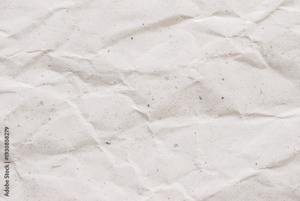 Obraz premium A sheet of a creased recycled subtle paper texture as background