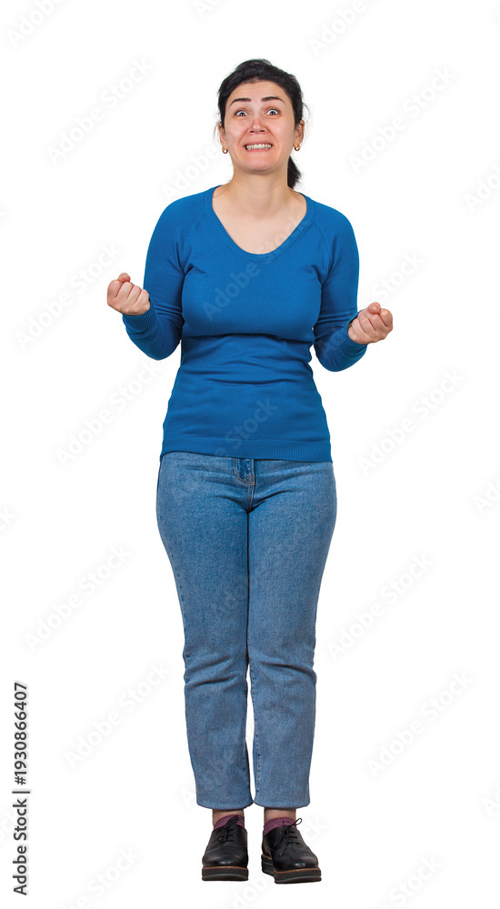 Fototapeta premium Full length portrait of an angry young woman holding fists tight and clenching teeth as scolding someone. Furious and anxious lady with negative emotions isolated on transparent background