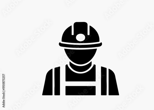 Black silhouette of a construction worker wearing a hard hat