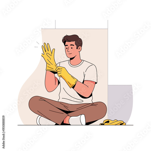 Man Putting On Yellow Cleaning Gloves Ready for Household Chores