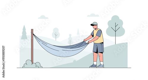 Man Preparing A Hammock For Outdoor Relaxation In Nature