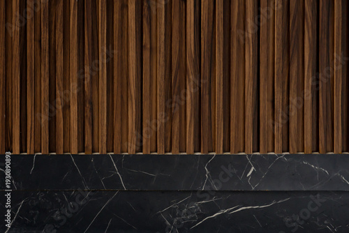 Cuadro en lienzo Elegant interior detail featuring vertical wood slats above a luxury black marbl
