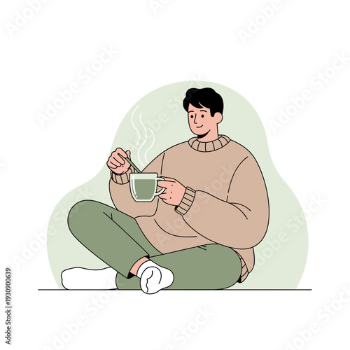 Relaxed Individual Preparing Hot Beverage in Comfortable Attire with Minimalist Background and