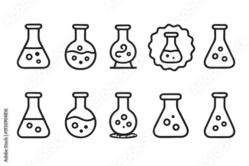 Assortment of laboratory flasks with bubbling liquid and different decorative elements