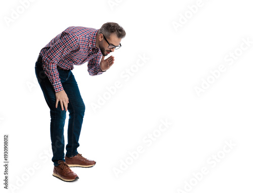 Side view of secretive casual man bending and whispering
