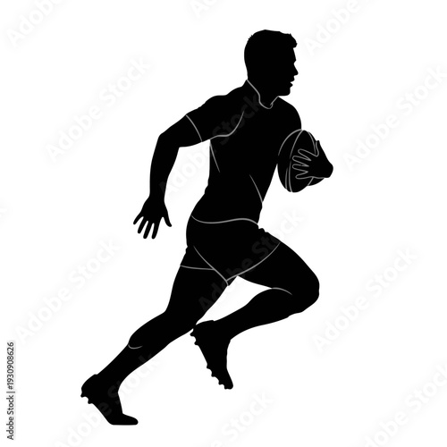 Athletic silhouette of a footballer in motion with ball during intense sporting action.
