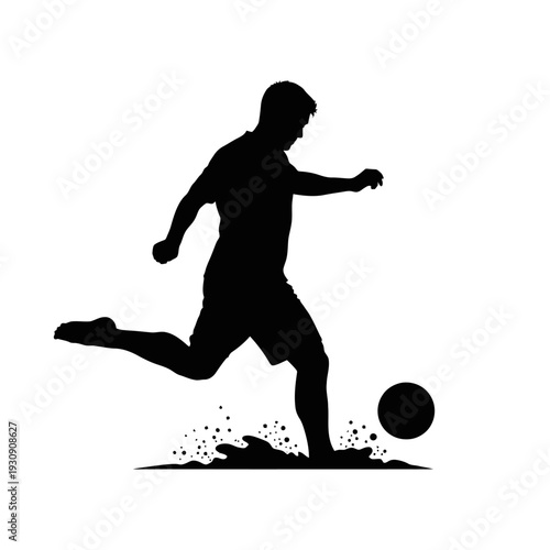 Silhouette of a Soccer Player in Mid Kick During Outdoor Action on a Grass Field.