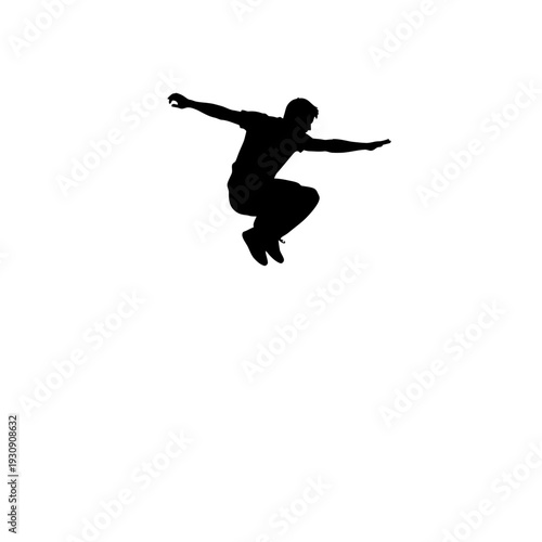Silhouette of a Person Jumping in the Air Capturing Athletic Motion and Dynamic Pose.