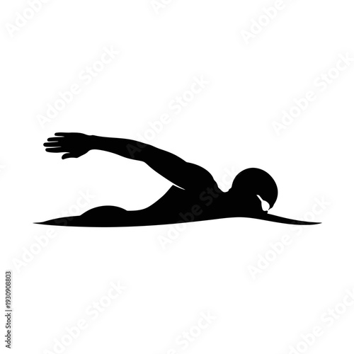 Silhouette of a swimmer performing freestyle stroke in water.