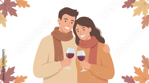 Happy young couple enjoying a romantic autumn evening with glasses of red wine, celebrating their love and togetherness.