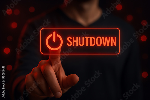 Finger pressing glowing shutdown button with futuristic digital concept representing control power system privacy safety and technology use