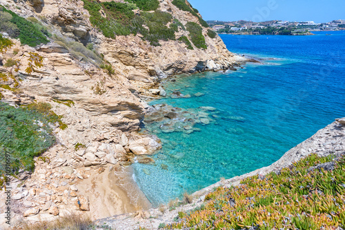 Crete, Greece – turquoise mediterranean bay with rocky coastline and crystal clear water on a sunny summer day, scenic coastal landscape ideal for travel and vacation themes.