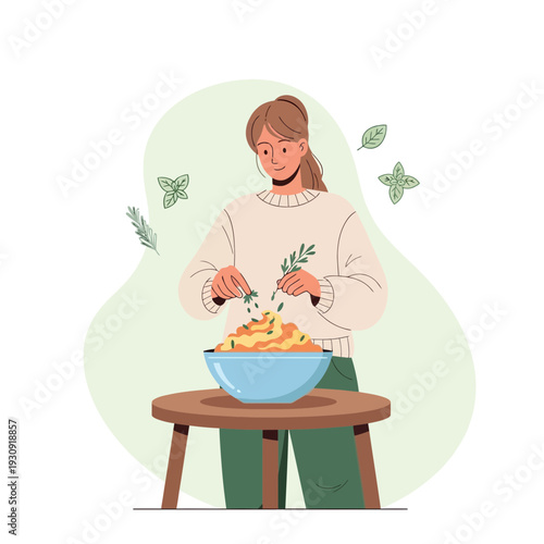 Woman Adding Fresh Herbs To Delicious Homemade Pasta Dish