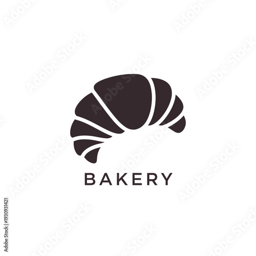 Croissant logo icon for bakery shop in dark chocolate color on transparent grid