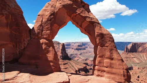 Wallpaper Mural Majestic natural rock arch formation in sunny desert canyon landscape Torontodigital.ca
