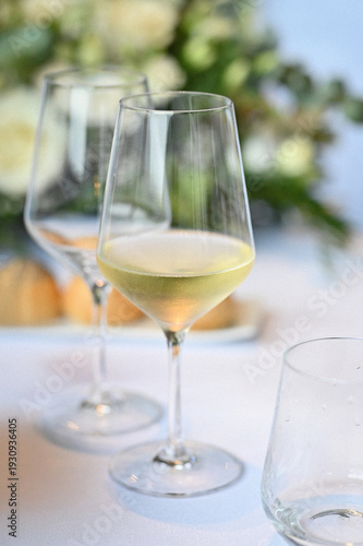 Elegant White Wine Glass on a Dining Table