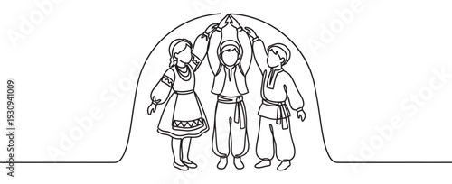 Three children in traditional folk costumes stand together forming an arch with their raised hands, symbolizing unity and cultural heritage.
