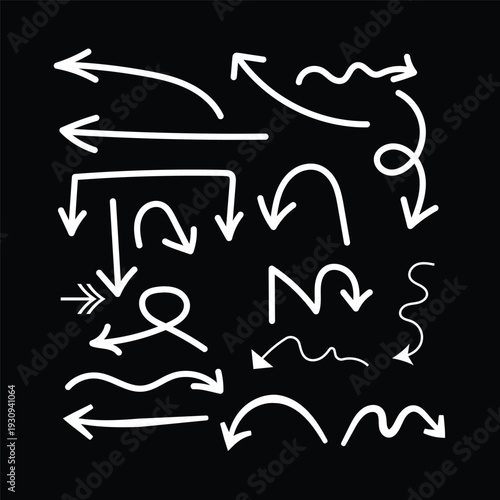 Collection of white hand drawn arrows on a black background