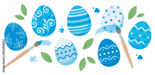 Decorated Easter eggs in various shades of blue with paintbrushes and green leaves, symbolizing spring and holiday celebration.
