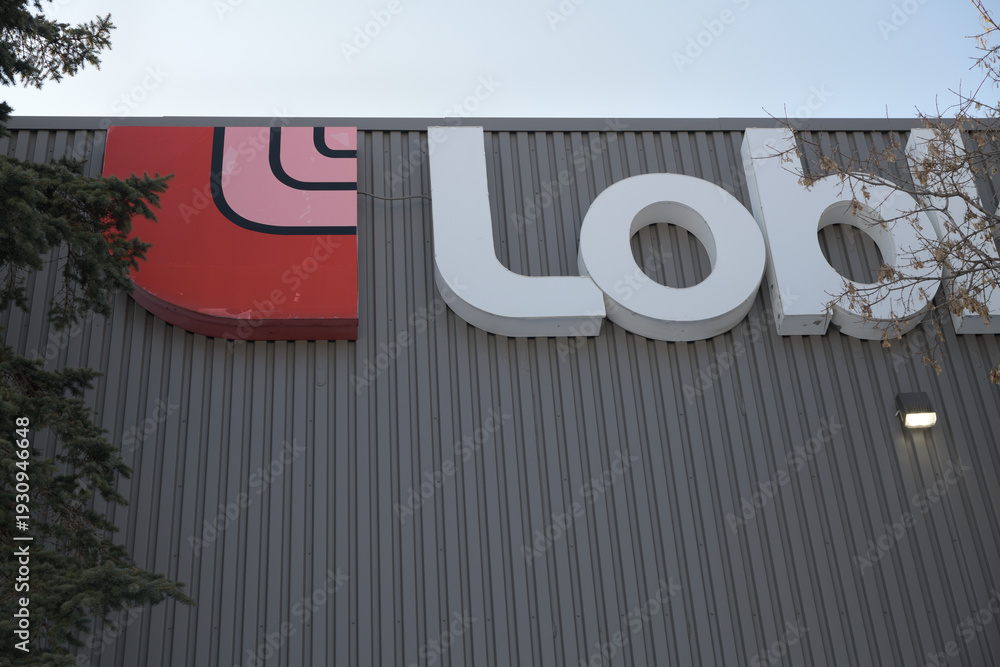 Fototapeta premium logo sign and name of Loblaws Musgrave Street location (50 Musgrave St, seen from Victoria Park Av), Toronto