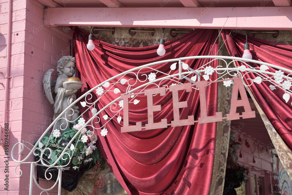 Obraz premium creative sign outside Leela Indian Food Bar at 1386 Gerrard St E, Toronto