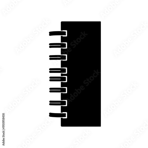 Black Spiral Bound Notebook with White Pages and Minimalist Cover on Desk for Writing and Planning.