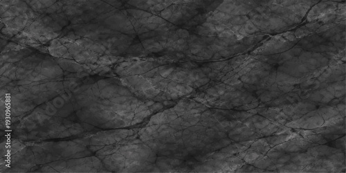 A dark and aged black stone texture features a rough grunge pattern on a vintage gray concrete surface, creating a weathered and textured backdrop for art and design