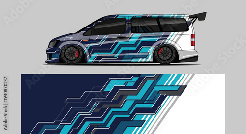 Sleek blue racing car with geometric teal pattern and rear wing on track.