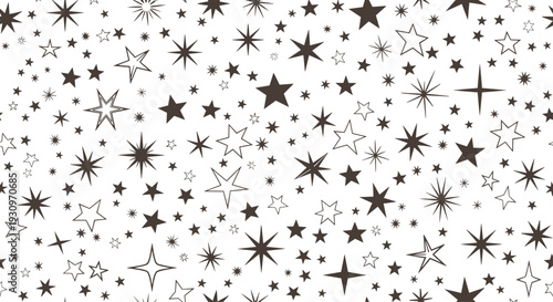 Seamless monochrome pattern of various black and white stars in different shapes and sizes scattered on a white background.