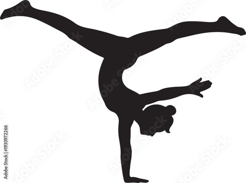 A powerful female gymnast executes a perfect handstand with her legs split wide open in mid air