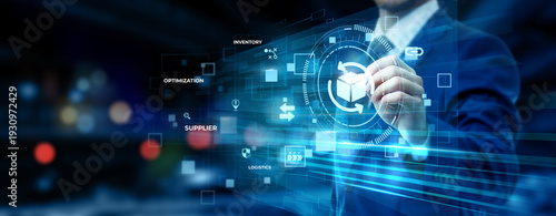Fotografie Businessman pointing at SCM technology on futuristic digital interface screen, l