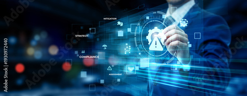 Businessman pointing at risk management technology on futuristic digital interface screen, business risk analysis, compliance system, corporate safety strategy concept