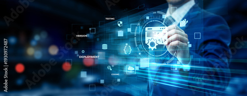 Businessman pointing at software development technology on futuristic digital interface screen, coding platform, application design system, IT solution innovation concept