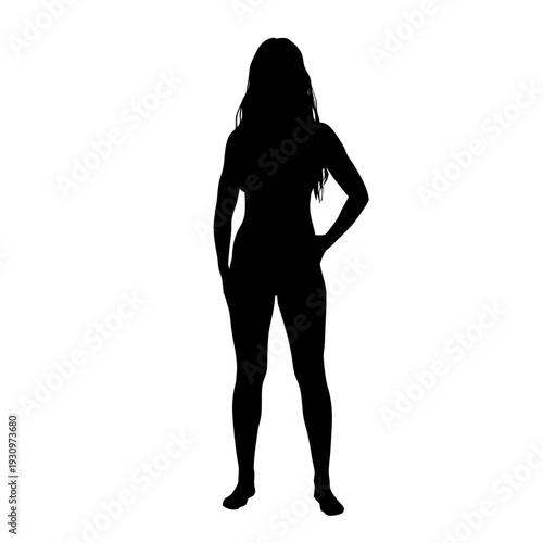 Confident woman standing with hands on hips in powerful pose