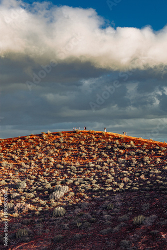 Hikers on Chayofita volcanic hill in Los Cristianos, south Tenerife, Canary Islands Spain