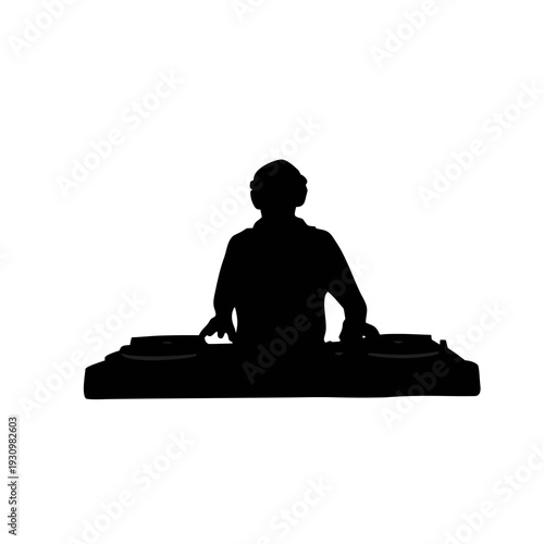 DJ performing at a music festival with turntables