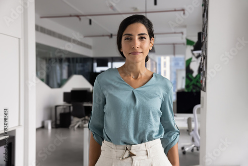 Valokuva Portrait smiling young adult Brazilian woman corporate worker startup founder ma