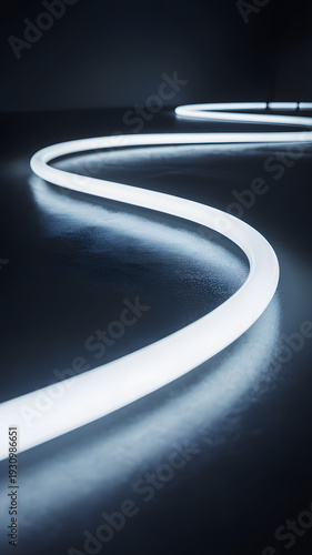 Flexible glowing LED strip lights on dark surface