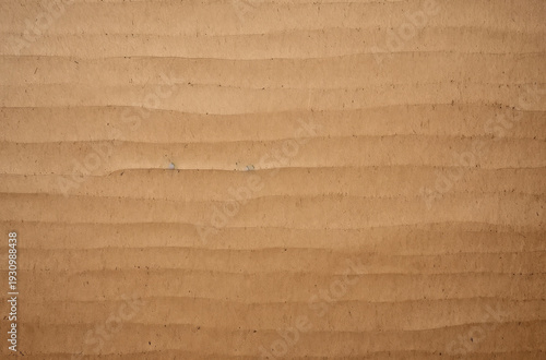 Processed collage of vintage brown cardboard paper texture. Background for banner, backdrop.