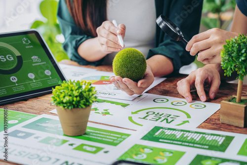 Obraz na plátně Business leaders collaborate on sustainability goals net zero carbon strategy fo