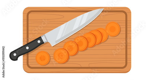 Knife and Sliced Carrots on Chopping Board.