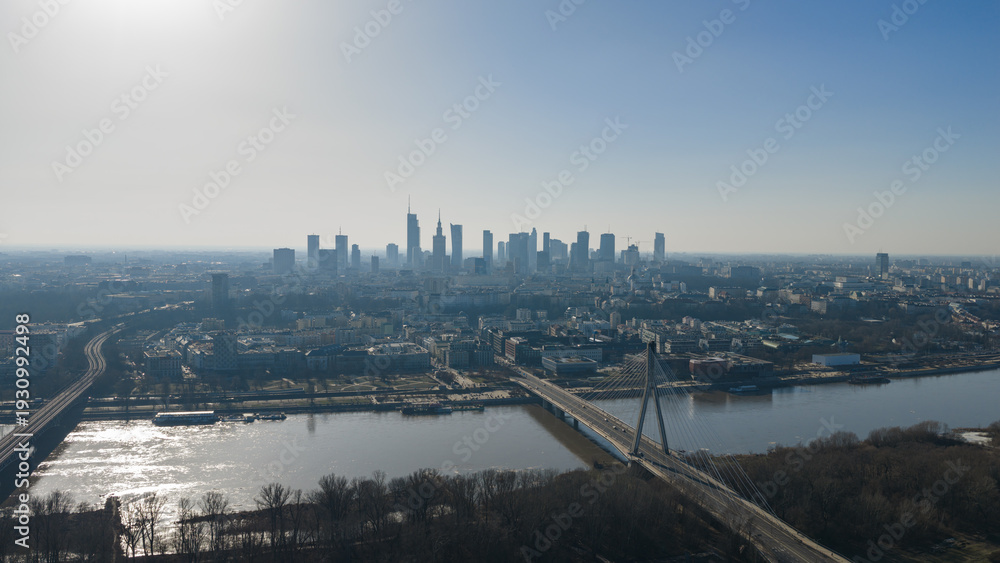 Fototapeta premium Aerial Warsaw skyline with Vistula River and Swietokrzyski Bridge