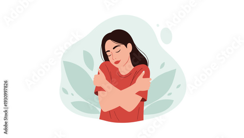 Young woman with long dark hair hugging herself with her eyes closed in a gesture of self-love and care against a leaf background.
