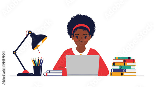 Focused black woman works efficiently on her laptop at a clean desk surrounded by colorful books and a modern desk lamp.