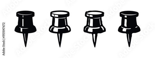 Set of four realistic black push pins or thumbtacks with highlights, vector illustration on white background.
