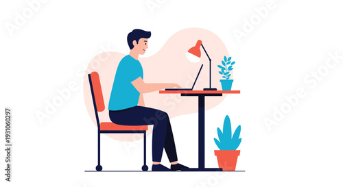 Focused young man works on a laptop while sitting at a modern desk equipped with a lamp and potted plants in an office.