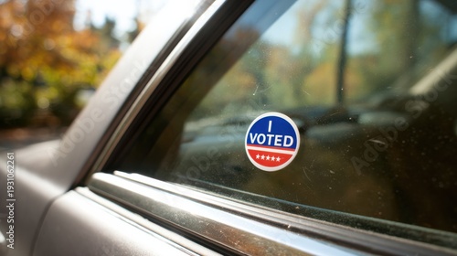I Voted sticker on a car window